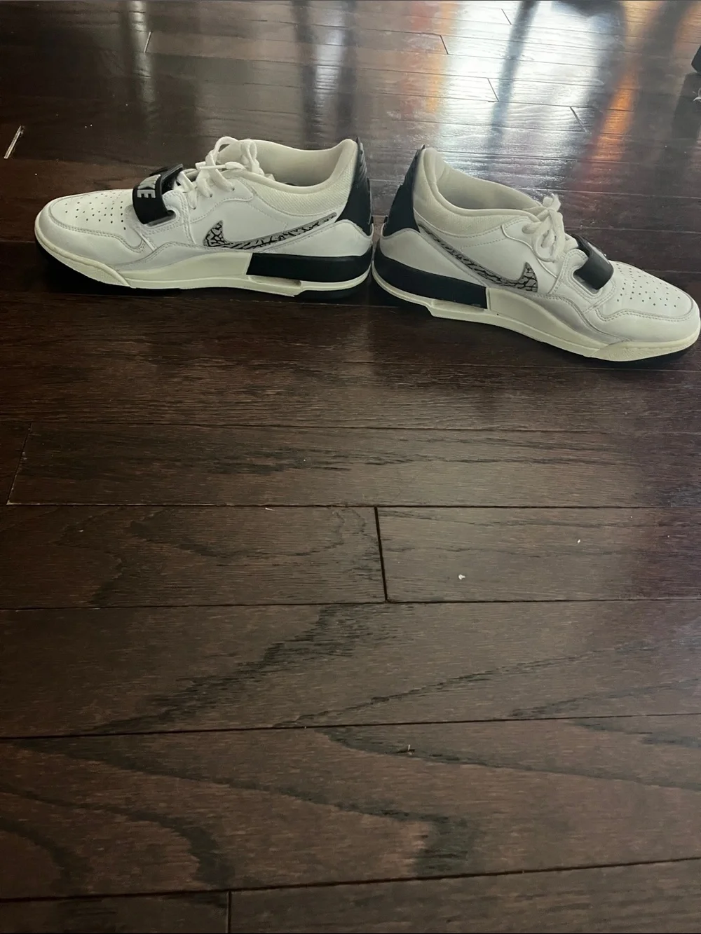 Nike White Low-Top Sneakers with Black Strap Accents